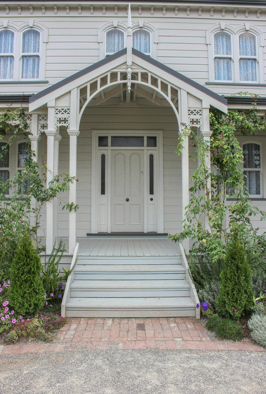 a white house with a white front door
