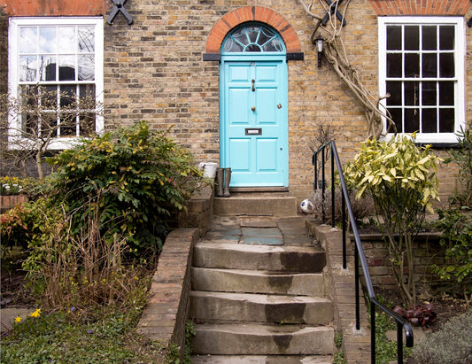 closed teal wooden doors