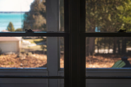black wooden framed glass window