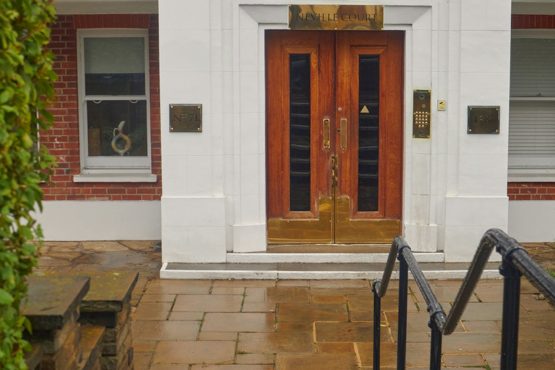 a red brick building with a wooden door
